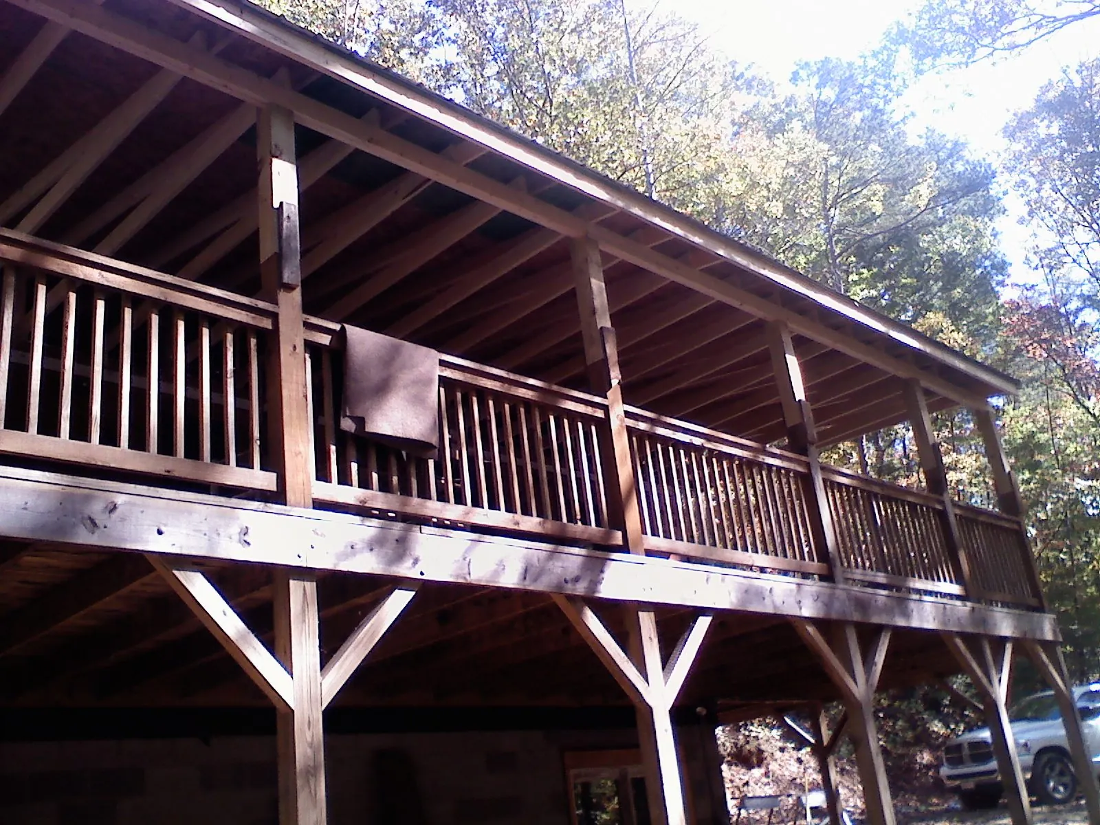 Timber framing under a new elevated porch and deck — Roof Leak Repair in Poolesville by Roofing Brothers